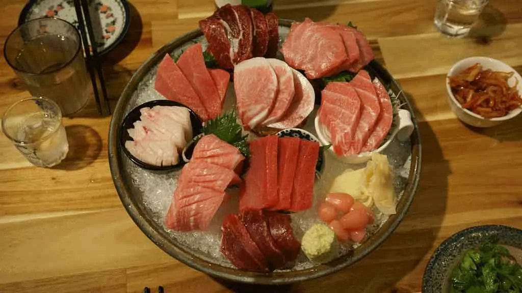 Platter of assorted fish on ice reflecting topic;best fish and seafood on a keto diet.