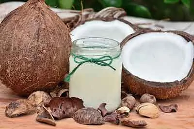 photo of a coconut with coconut oil.