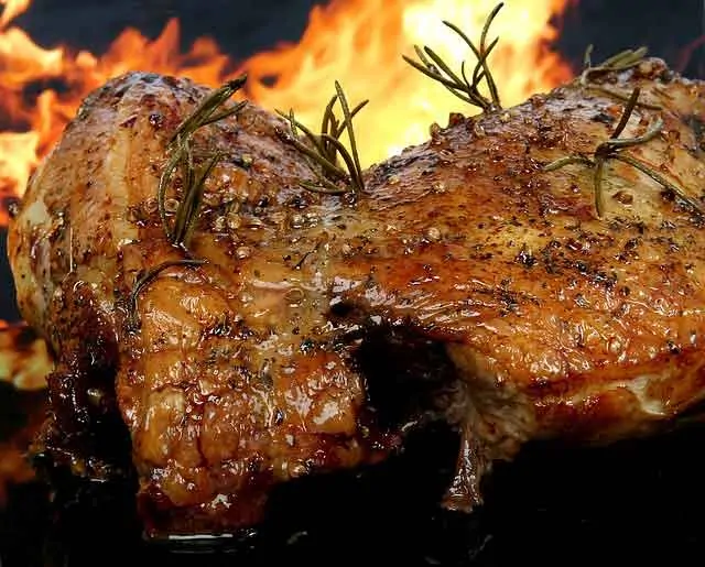 photo of meat on a barbeque