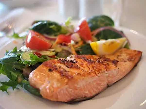 Cooked salmon on a plate; best fish and seafood on a keto diet