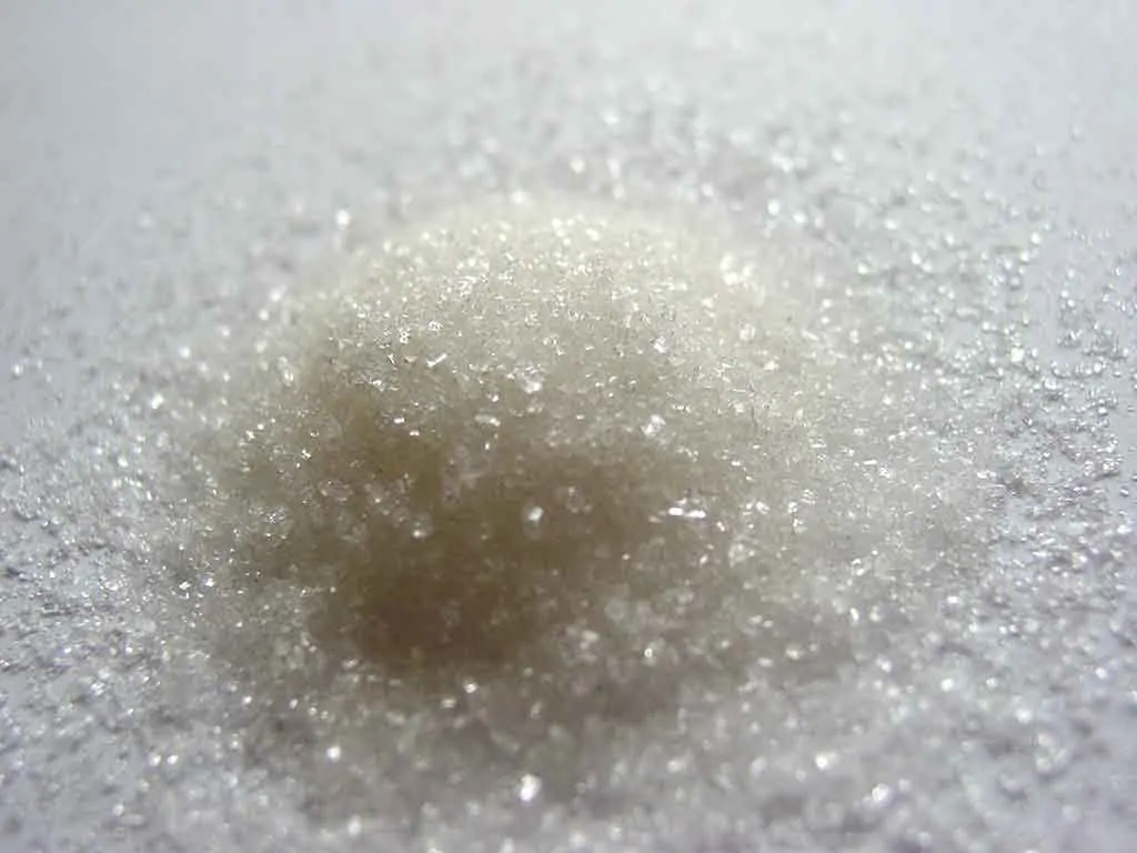 Photo of white sugar granules; why is a keto diet good for MS?