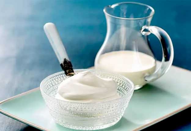 photo of jug of cream and a pot of whipped cream relflecting page topic which is Best dairy foods to eat on a keto diet.