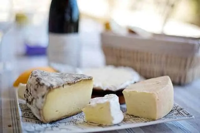 photo tray of french cheeses which reflects the topic of the page - best dairy foods to eat on a keto diet