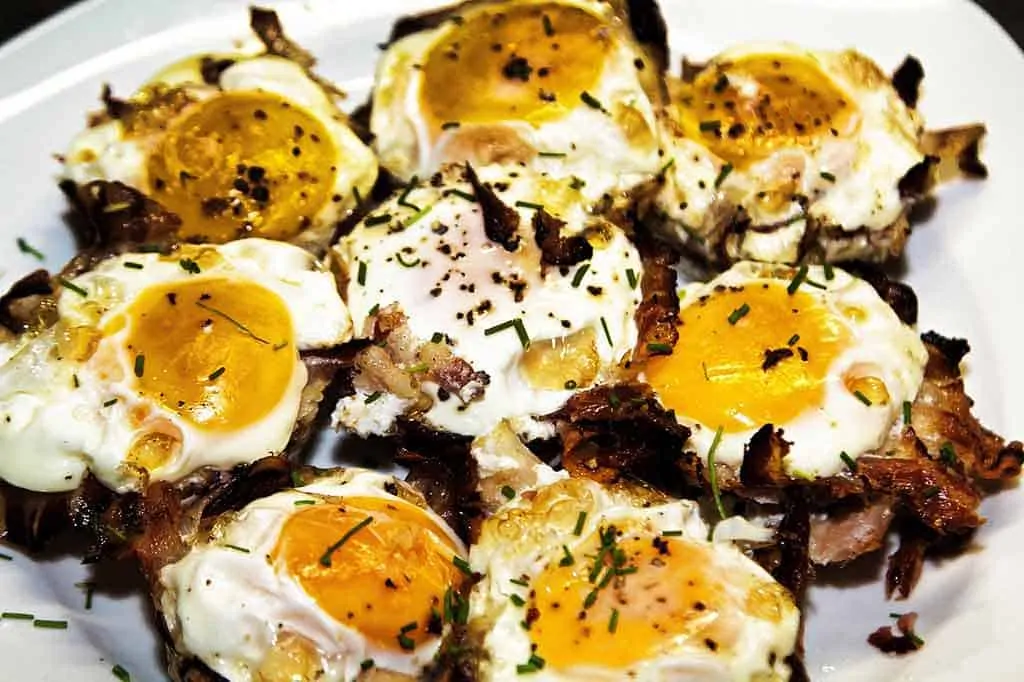 photo of cooked eggs on a plate reflecting the topic of the page - best foods to eat on a keto diet.