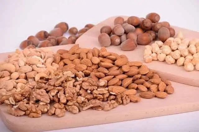 photo of nuts spread on a cutting board; best foods to eat on a keto diet.